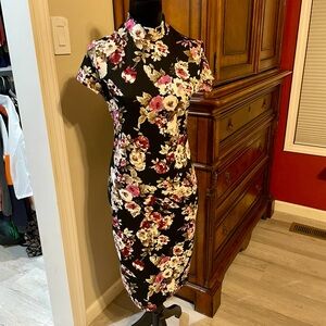 Black floral bodycon dress.